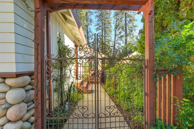 a view of a house with a potted plant