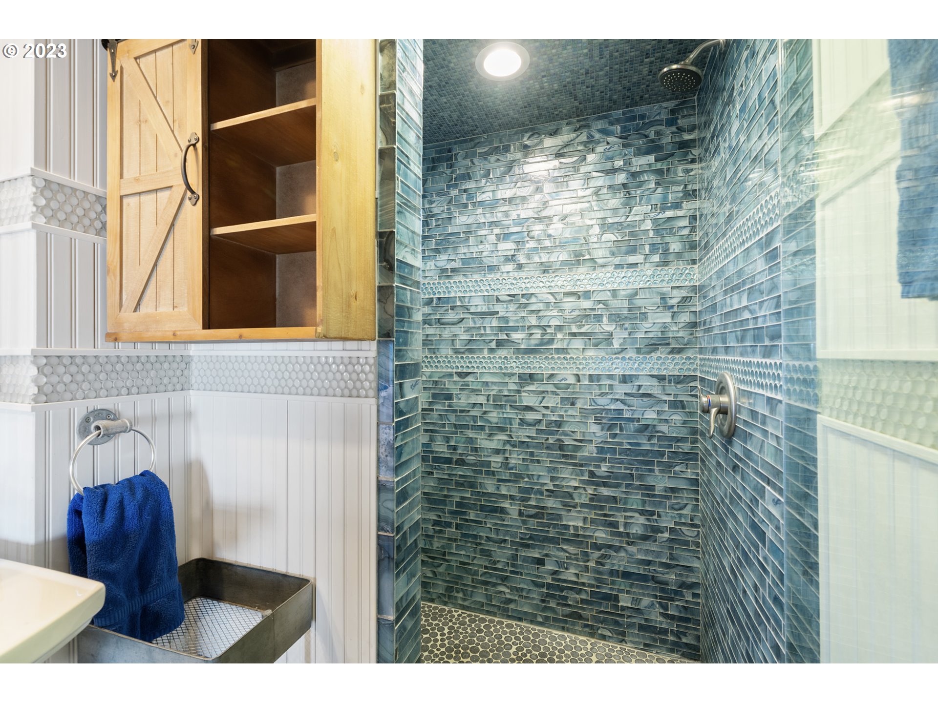 5430 2nd Street Northwest Tillamook, OR 97141 - Photo 23 of 48 a bathroom with a shower