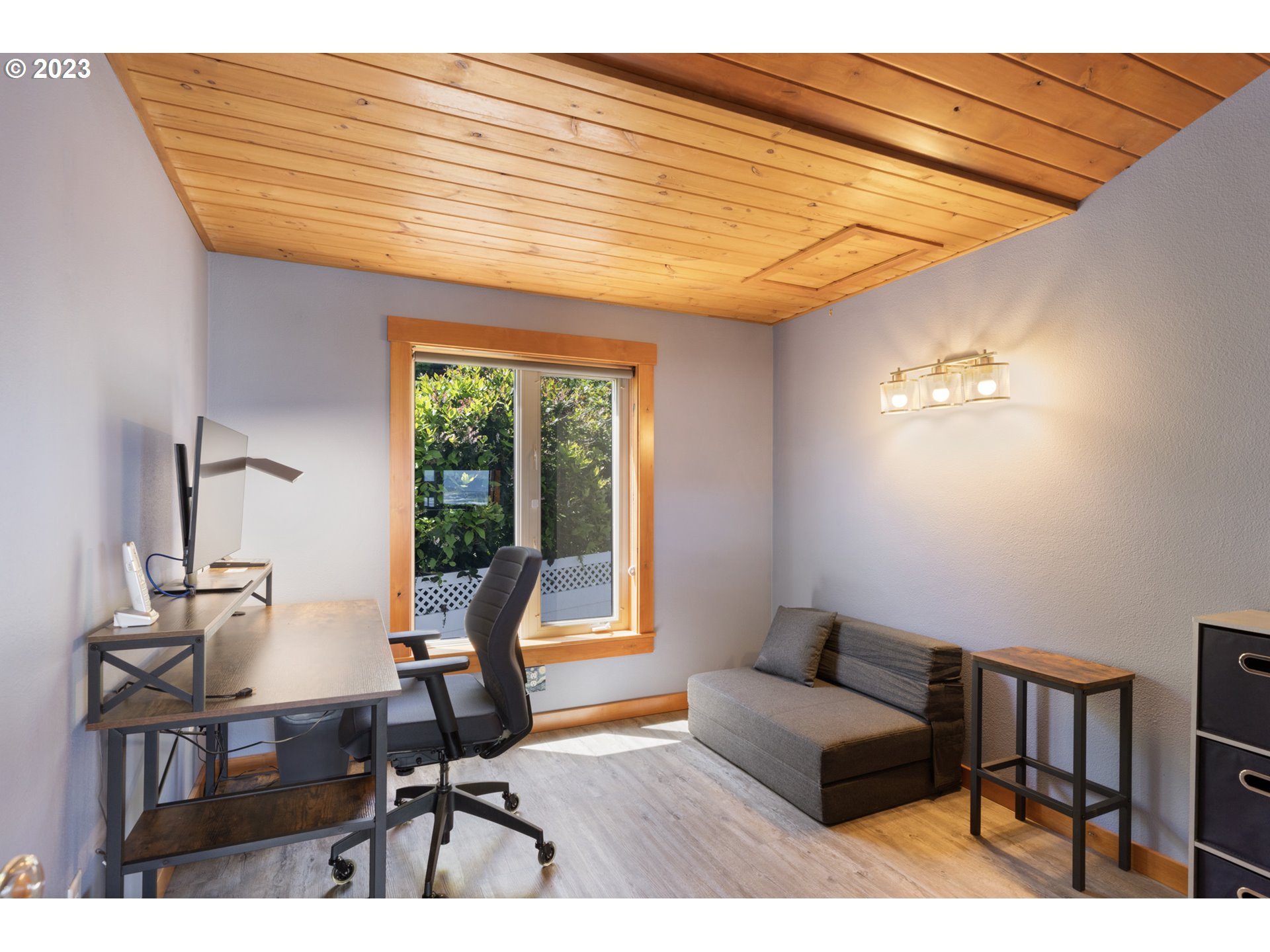 5430 2nd Street Northwest Tillamook, OR 97141 - Photo 27 of 48 a workspace with furniture and window