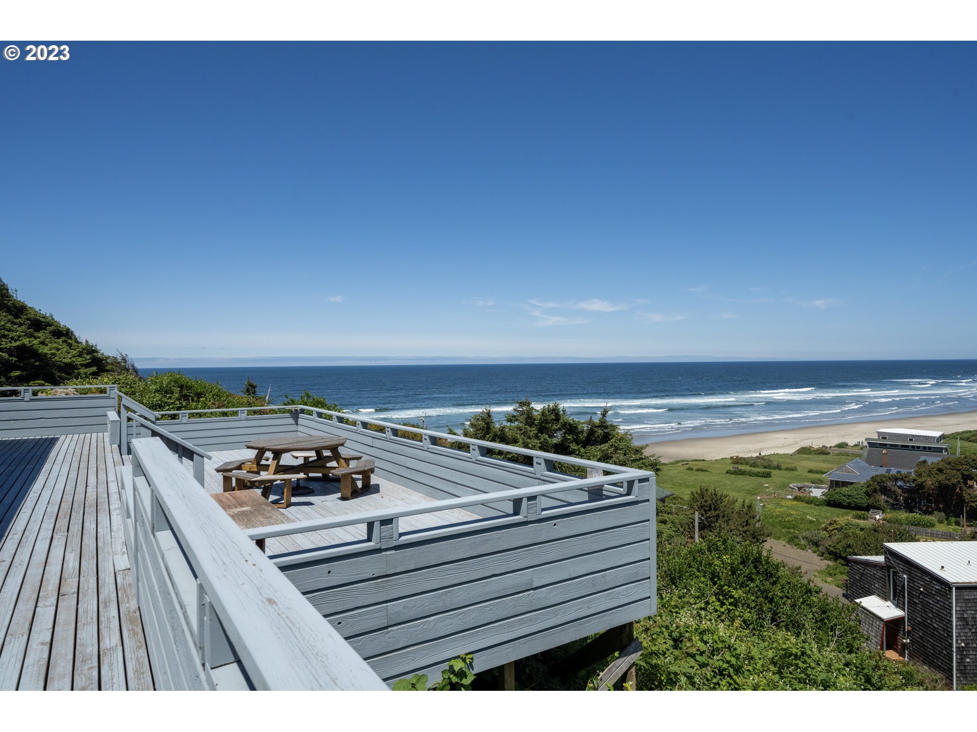 5430 2nd Street Northwest Tillamook, OR 97141 - Photo 28 of 48 a view of a balcony with wooden floor and outdoor space