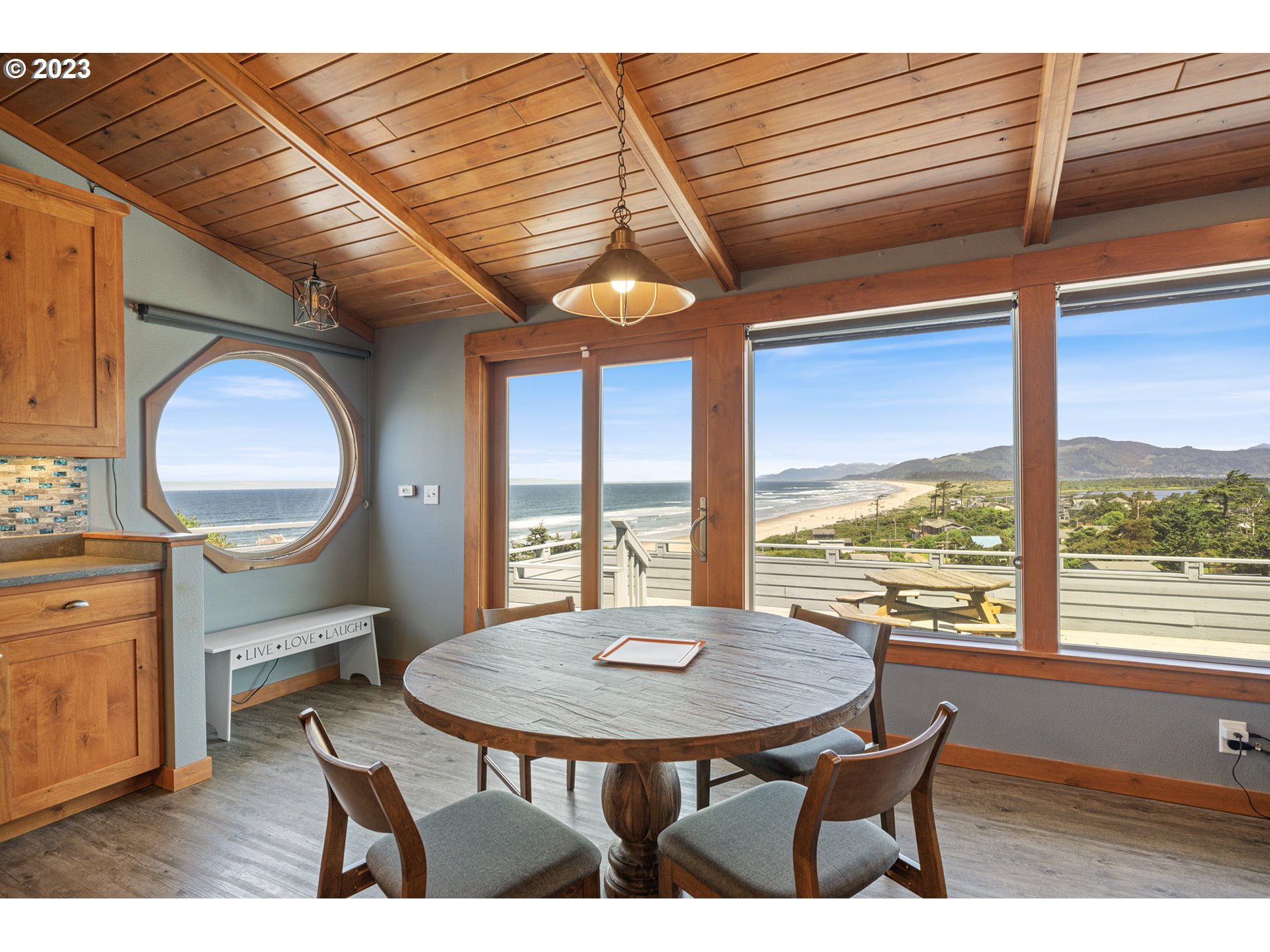 5430 2nd Street Northwest Tillamook, OR 97141 - Photo 10 of 48 a view of a dining room with furniture window and outside view