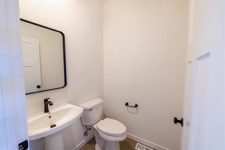 14192 Prairie Commons Lane South Beloit, IL 61080 - Photo 12 of 29 a bathroom with a sink and a mirror