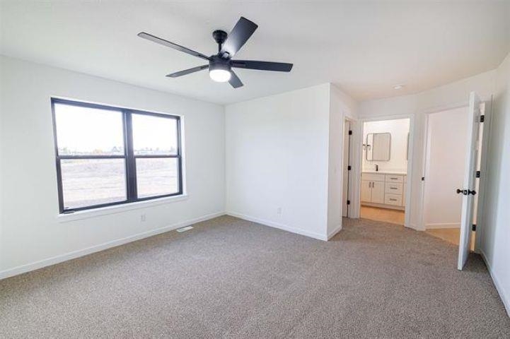 14192 Prairie Commons Lane South Beloit, IL 61080 - Photo 18 of 29 a view of an empty room with a window