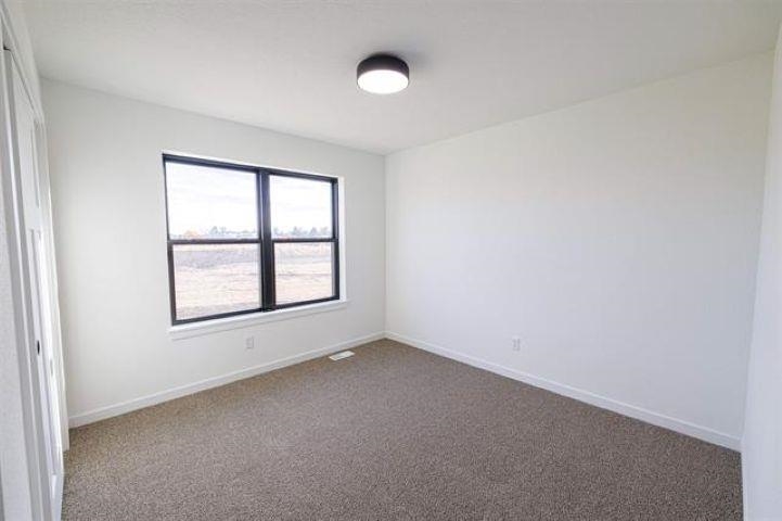 14192 Prairie Commons Lane South Beloit, IL 61080 - Photo 21 of 29 an empty room with a window