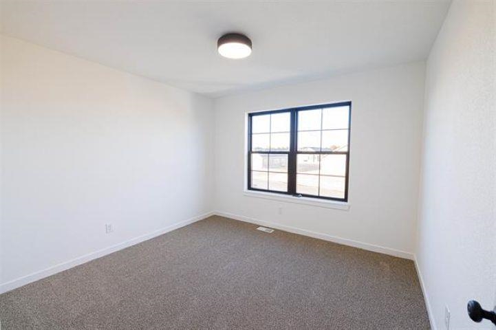 14192 Prairie Commons Lane South Beloit, IL 61080 - Photo 23 of 29 an empty room with a window