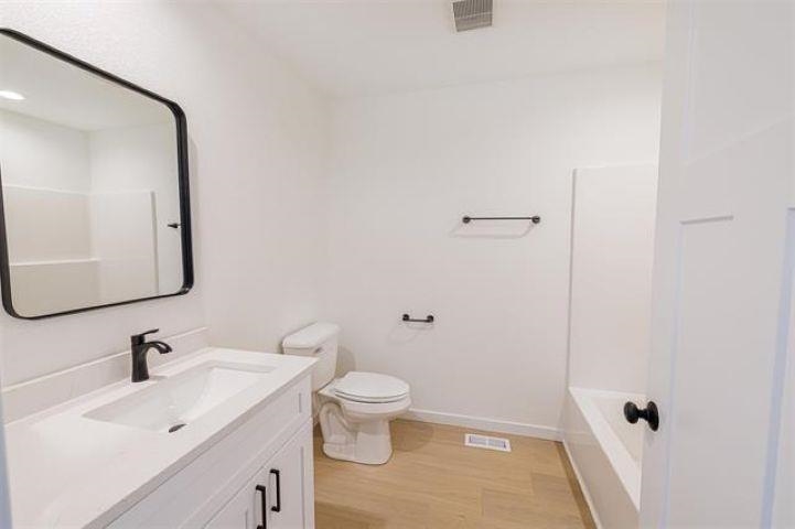 14192 Prairie Commons Lane South Beloit, IL 61080 - Photo 24 of 29 a bathroom with a sink toilet and shower