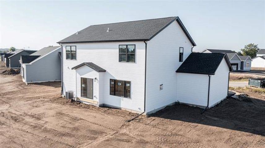 14192 Prairie Commons Lane South Beloit, IL 61080 - Photo 3 of 29 a view of a white house