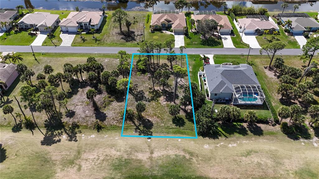 242 Marker Road Rotonda West, FL 33947 - Photo 6 of 9 an aerial view of multiple house