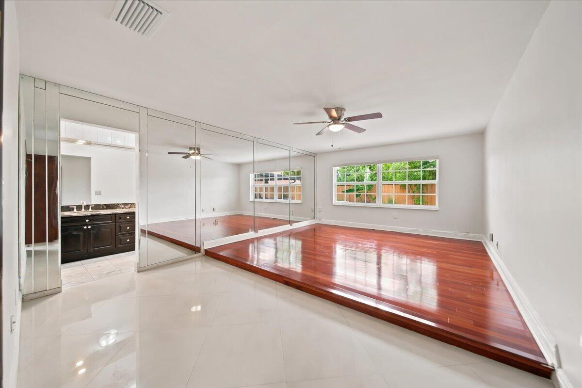 20009 Northwest 66th Place Hialeah, FL 33015 - Photo 16 of 33 a view of an empty room and a window