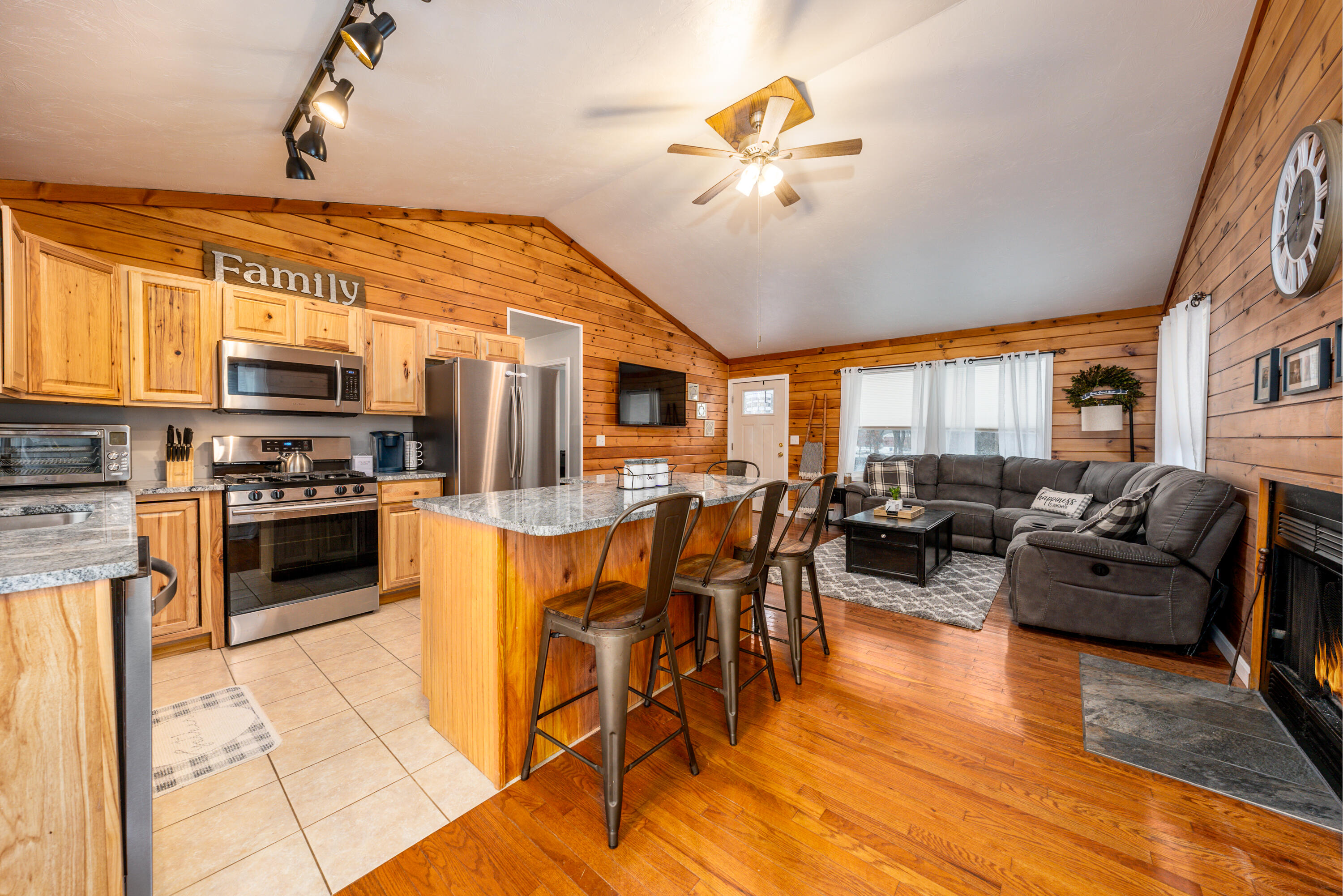 5 Tremont Center Road West Wareham, MA 02576 - Photo 1 of 17 a kitchen with stainless steel appliances kitchen island granite countertop a stove and a view of living room