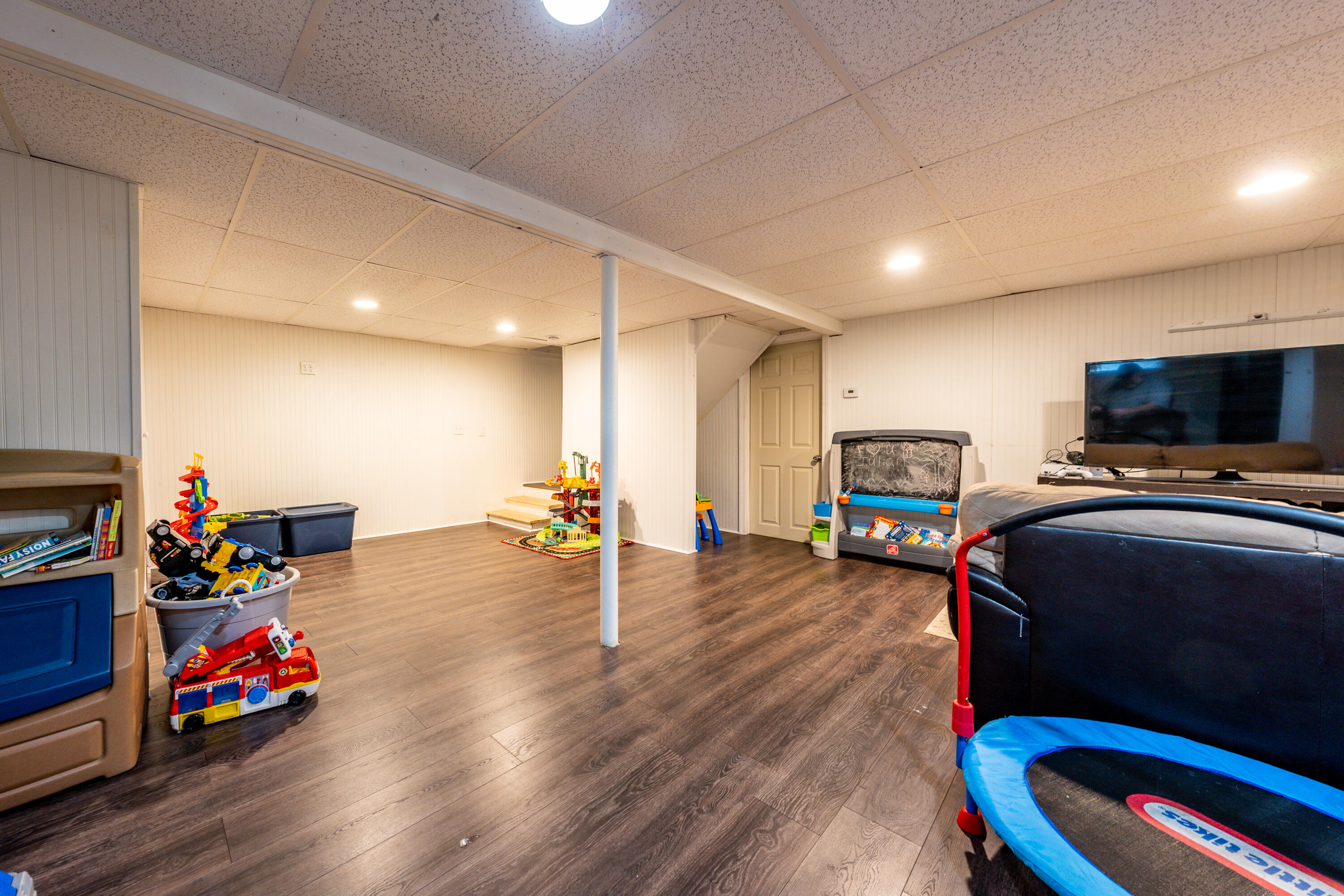 5 Tremont Center Road West Wareham, MA 02576 - Photo 14 of 17 a living room with furniture and a flat screen tv