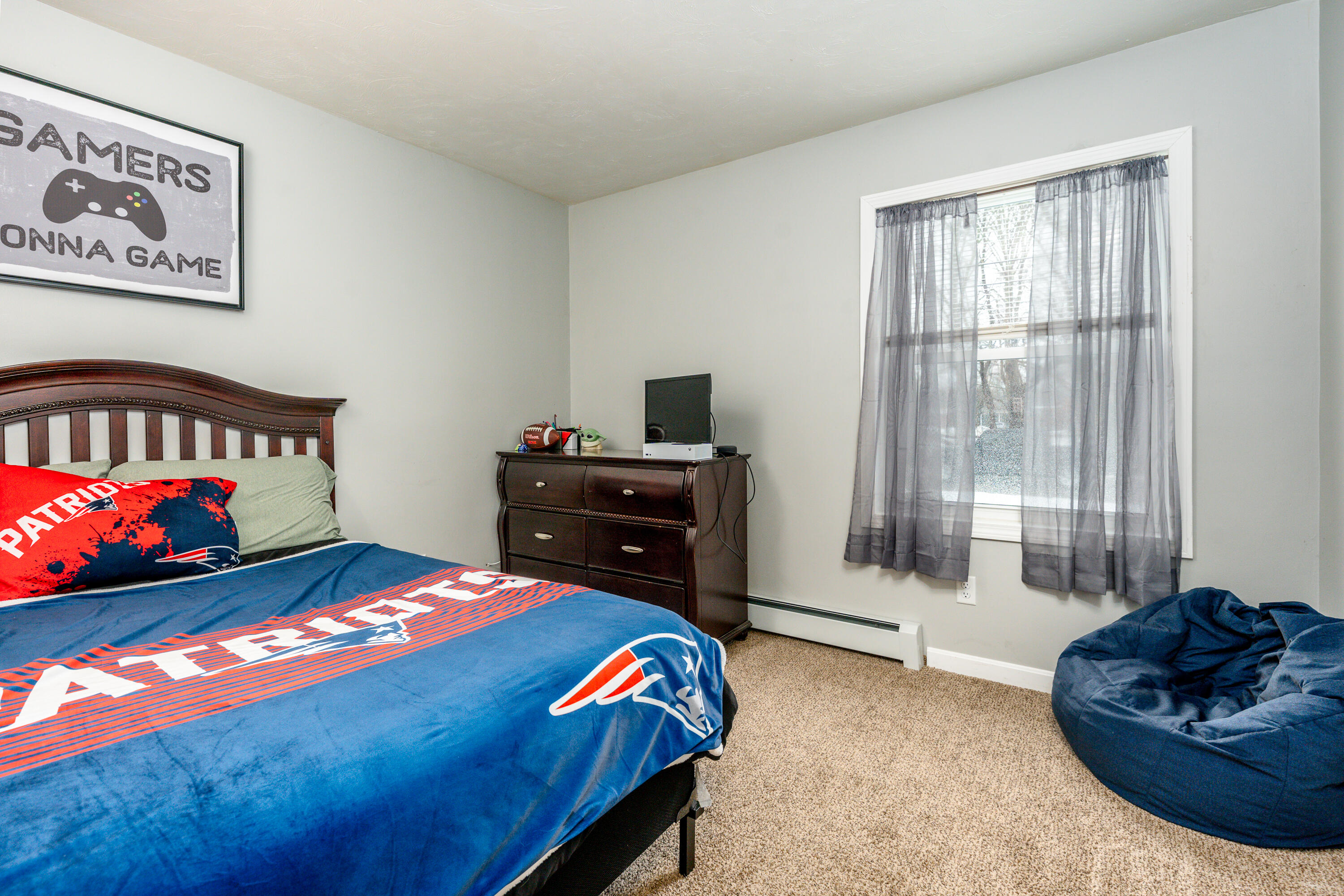 5 Tremont Center Road West Wareham, MA 02576 - Photo 8 of 17 a bedroom with a bed and a window