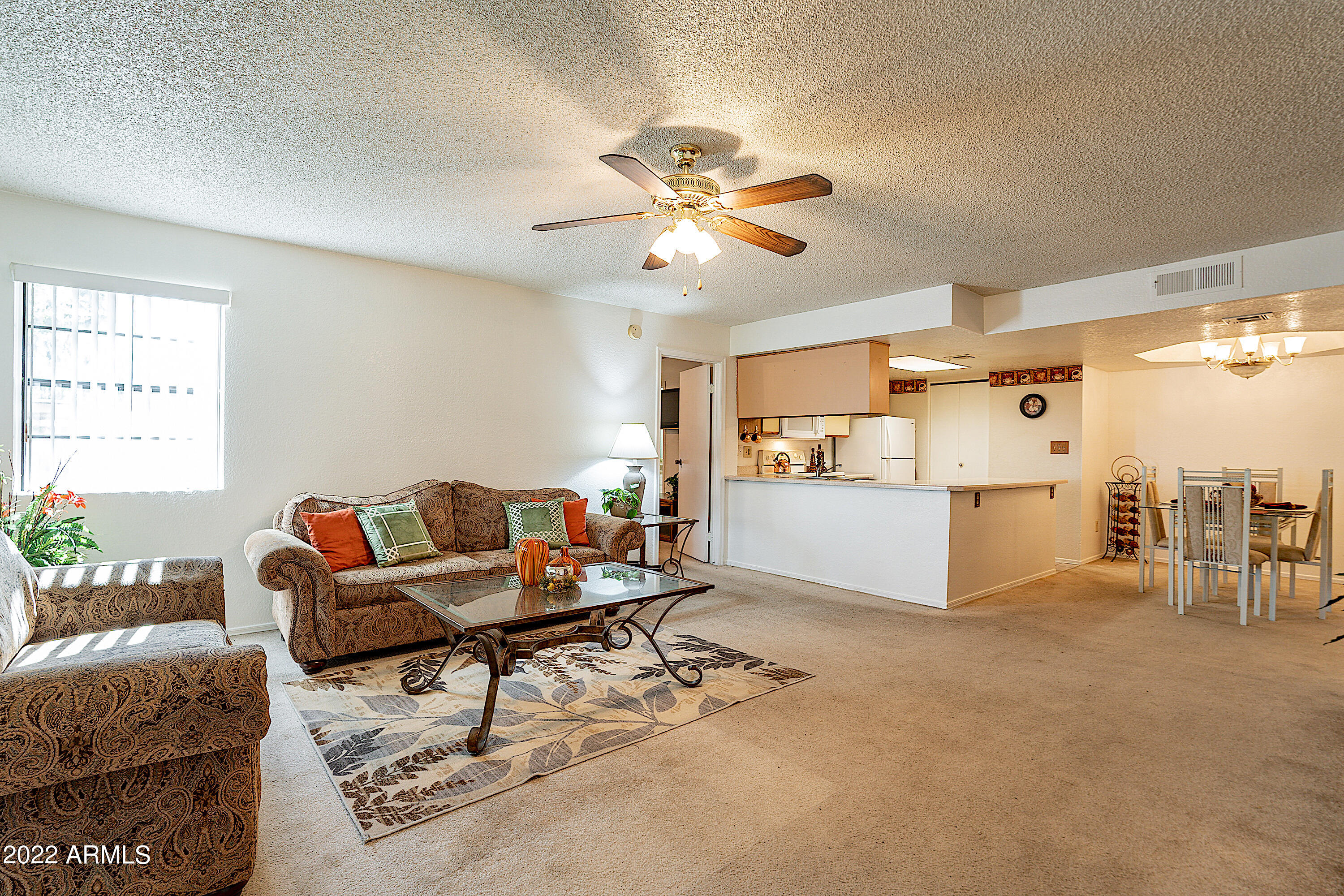 2855 South Ext Road, Unit 121 Mesa, AZ 85210 - Photo 6 of 27 06-Living room and kitchen
