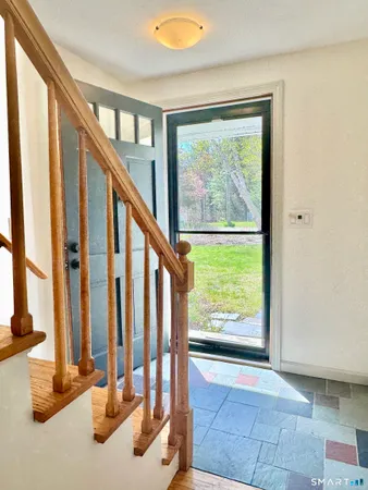 a view of an entryway with hardwood