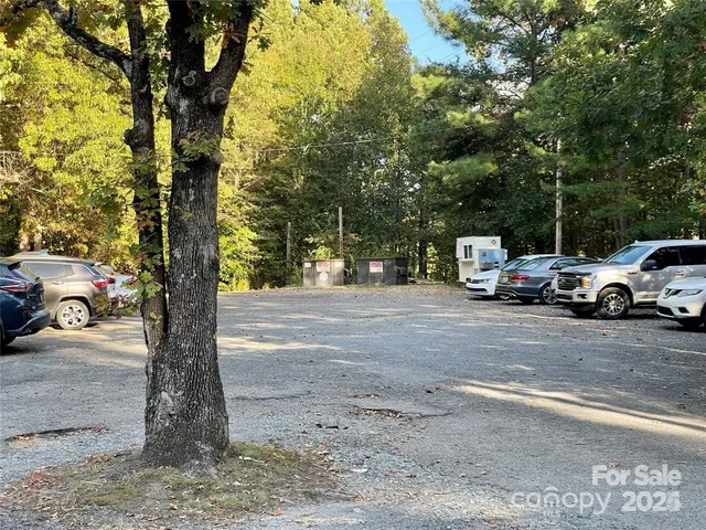 a view of street with parked cars