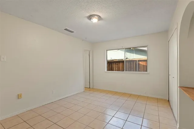 a view of an empty room with window