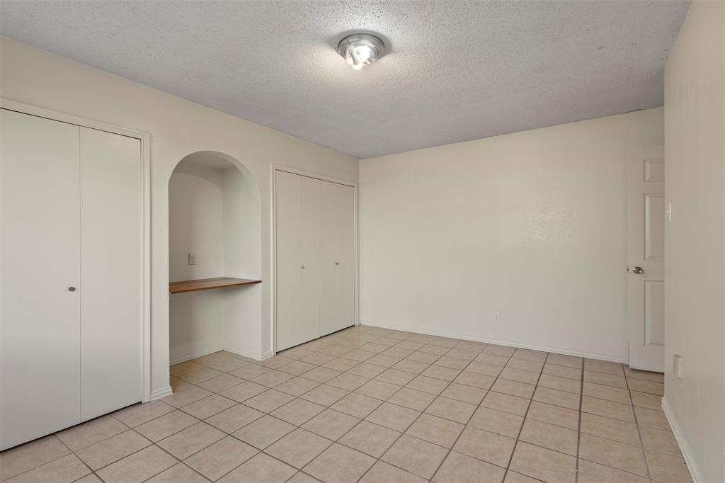 1400 Ridgecrest Drive Plano, TX 75074 - Photo 15 of 32 a view of an empty room and window