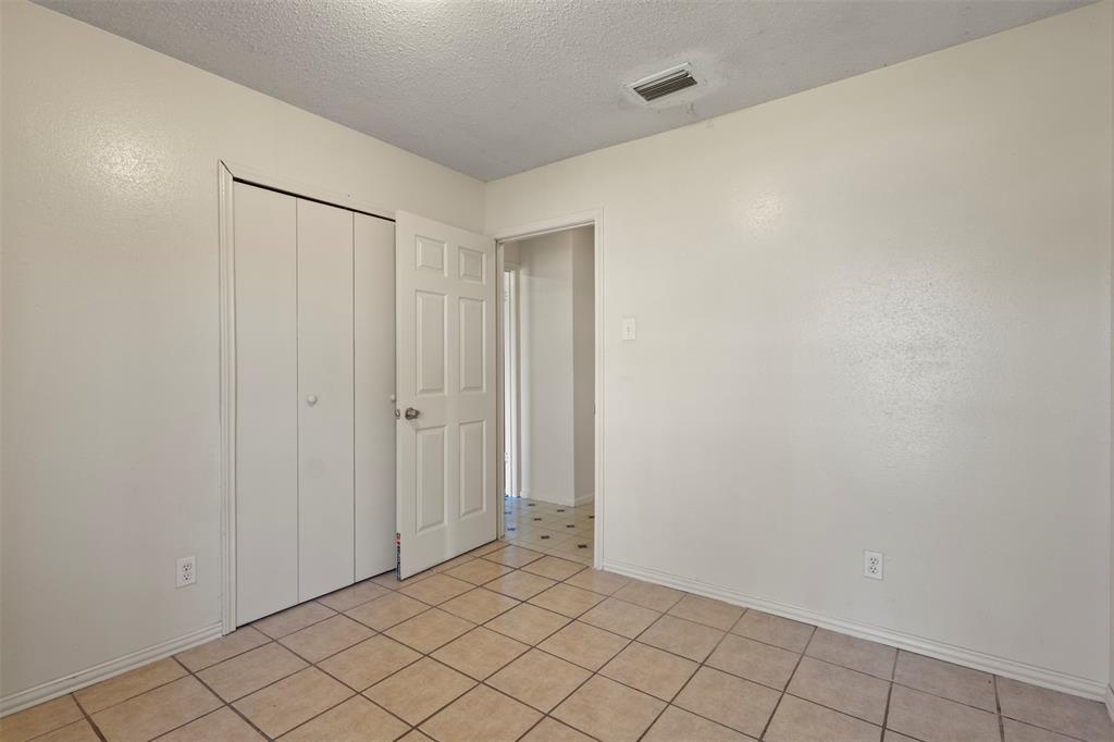 1400 Ridgecrest Drive Plano, TX 75074 - Photo 18 of 32 a view of an empty room