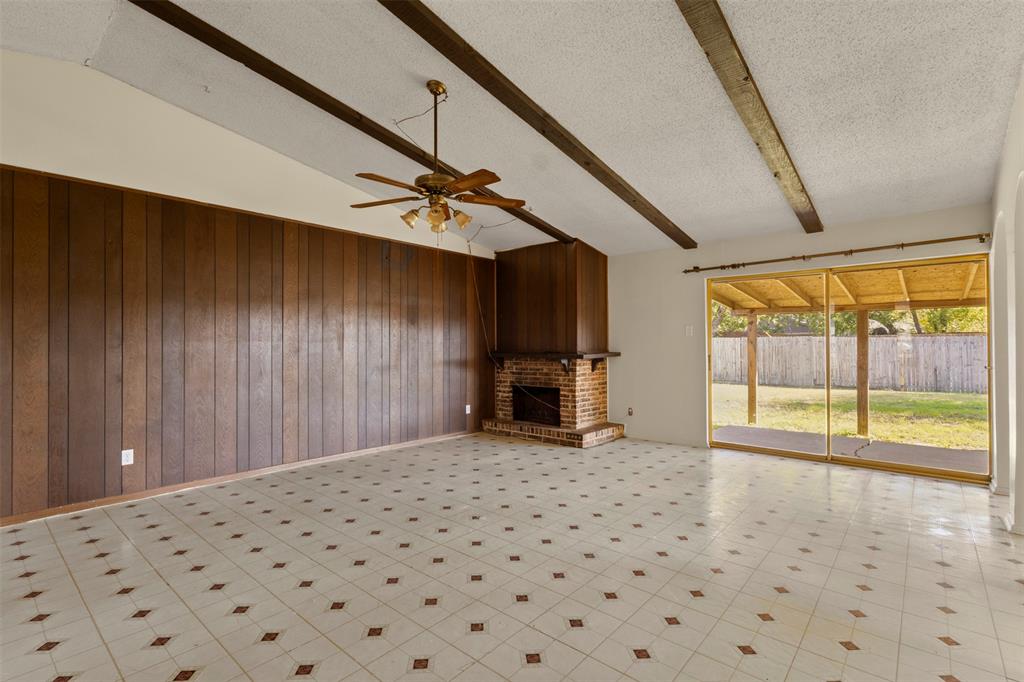 1400 Ridgecrest Drive Plano, TX 75074 - Photo 5 of 32 a view of a livingroom with wooden floor and staircase