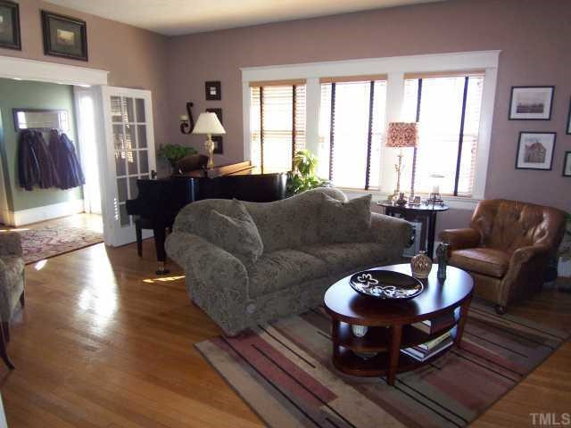 519 Gardner Street Raleigh, NC 27607 - Photo 4 of 12 The living room as seen from the dining room Living Room