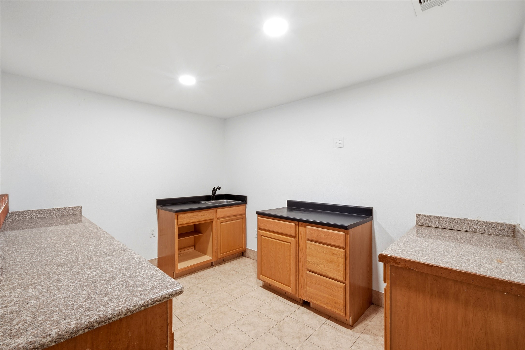 11741 Ezekiel Road Tomball, TX 77375 - Photo 18 of 30 a room with storage and utility