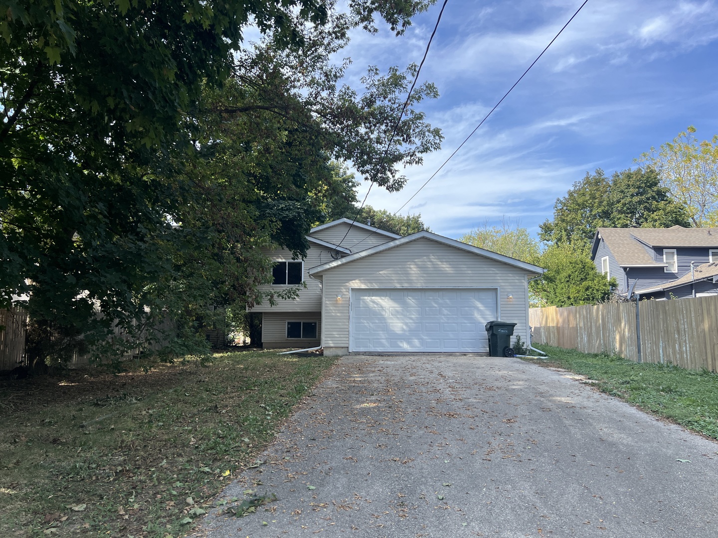 2207 Gabriel Avenue Zion, IL 60099 - Photo 13 of 13 a front view of a house with a yard and garage