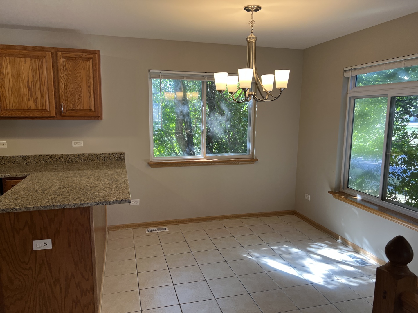 2207 Gabriel Avenue Zion, IL 60099 - Photo 4 of 13 a view of an empty room with a window