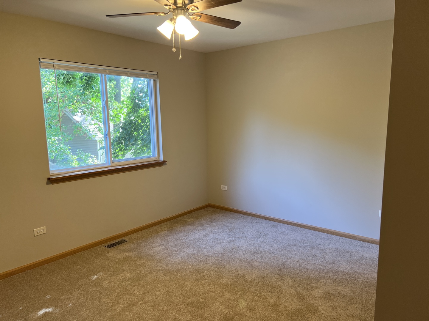 2207 Gabriel Avenue Zion, IL 60099 - Photo 5 of 13 a view of an empty room with a window