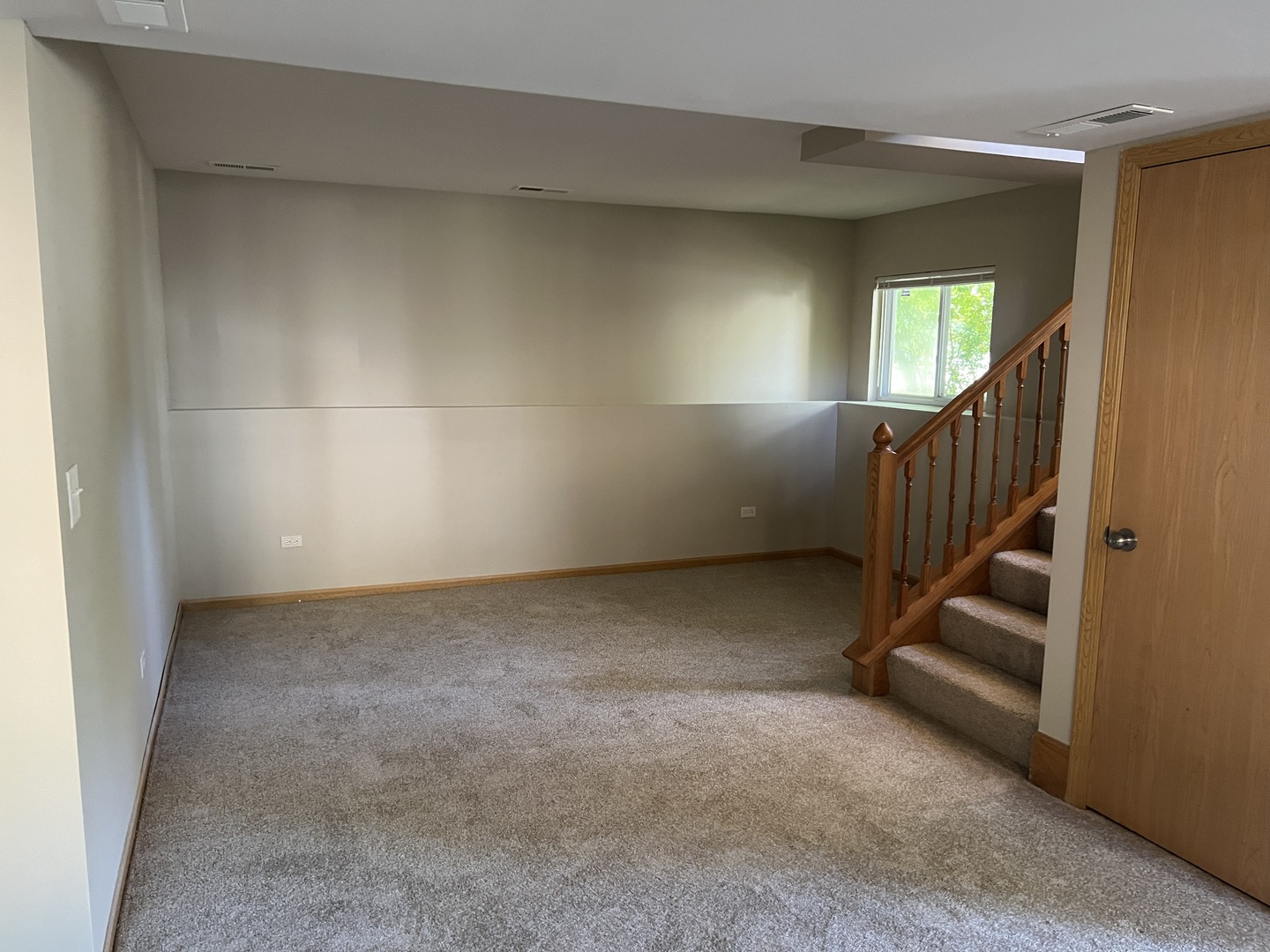2207 Gabriel Avenue Zion, IL 60099 - Photo 8 of 13 a view of an empty room with stairs