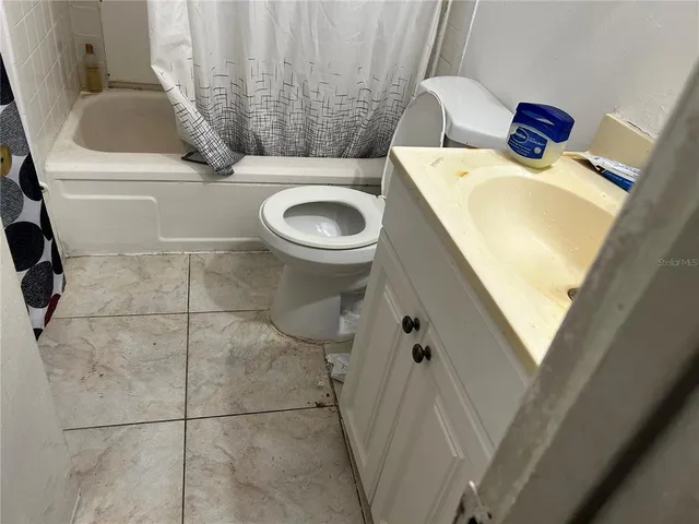 a bathroom with a sink and toilet