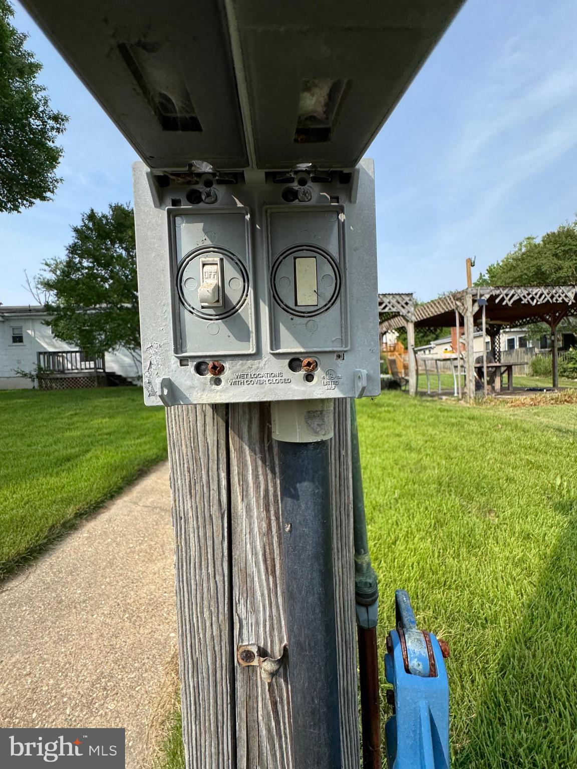 372 Riverside Drive Pasadena, MD 21122 - Photo 12 of 19 a view of a fireplace and a kitchen in the back