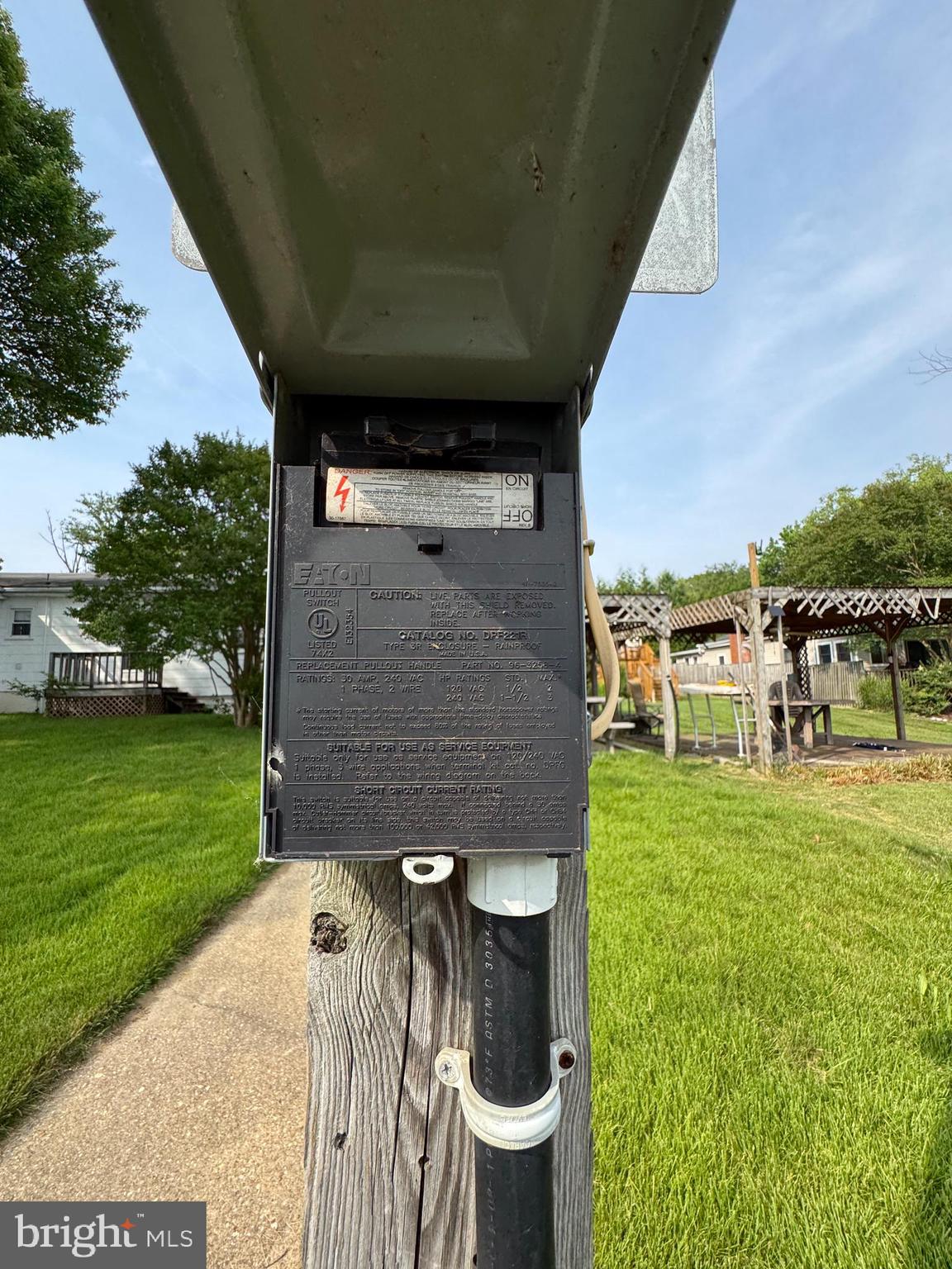 372 Riverside Drive Pasadena, MD 21122 - Photo 13 of 19 a backyard of a house with table and chairs