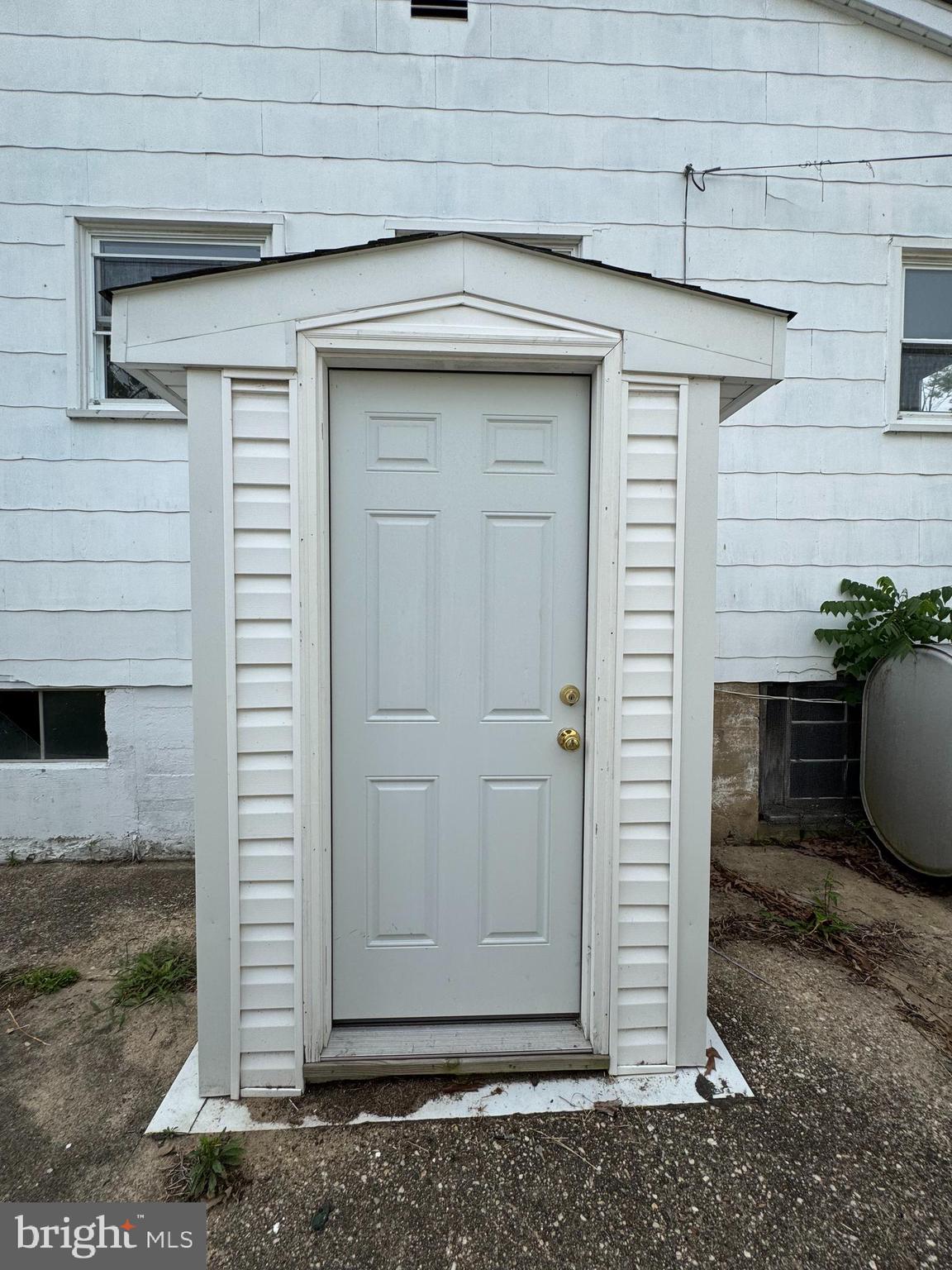 372 Riverside Drive Pasadena, MD 21122 - Photo 19 of 19 a front view of a house with entryway