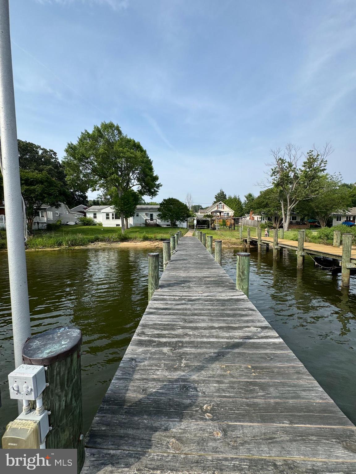 372 Riverside Drive Pasadena, MD 21122 - Photo 3 of 19 a view of boats and trees in the background