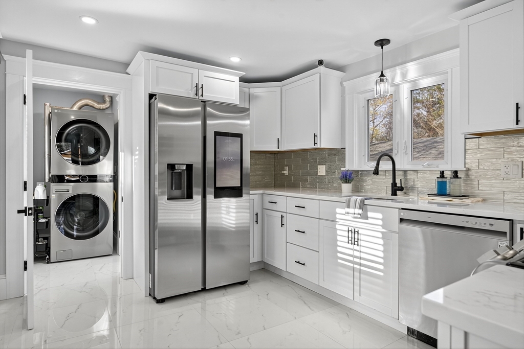 23 R Eddy Street North Attleboro, MA 02760 - Photo 13 of 29 a kitchen with a refrigerator sink and cabinets