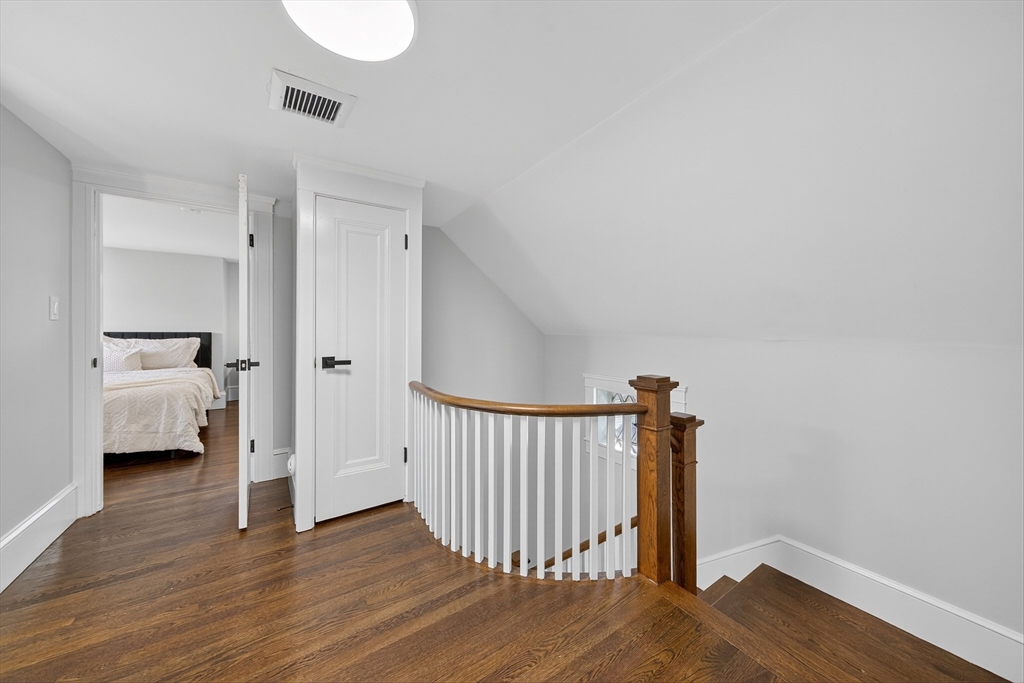 23 R Eddy Street North Attleboro, MA 02760 - Photo 19 of 29 a view of a room with wooden floor and a ceiling fan