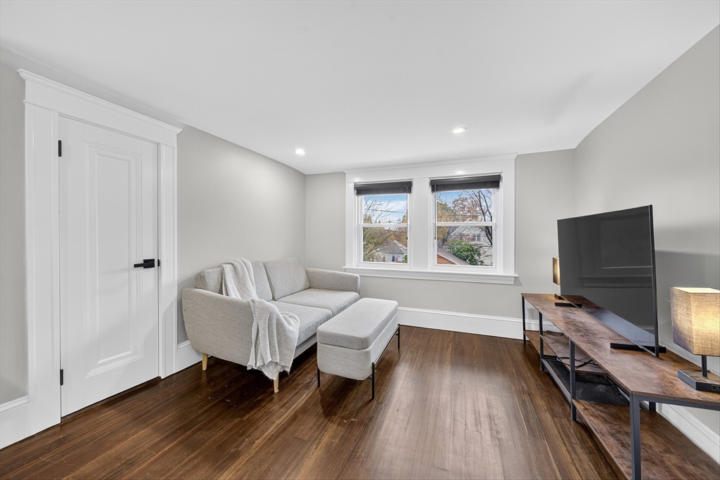 23 R Eddy Street North Attleboro, MA 02760 - Photo 20 of 29 a living room with furniture and a flat screen tv