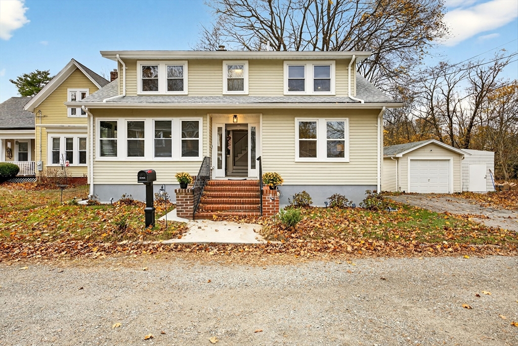 23 R Eddy Street North Attleboro, MA 02760 - Photo 2 of 29 a front view of a house with a yard and seating space