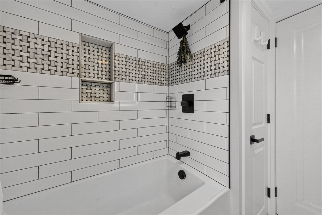 23 R Eddy Street North Attleboro, MA 02760 - Photo 23 of 29 a bathroom with a bathtub and shower