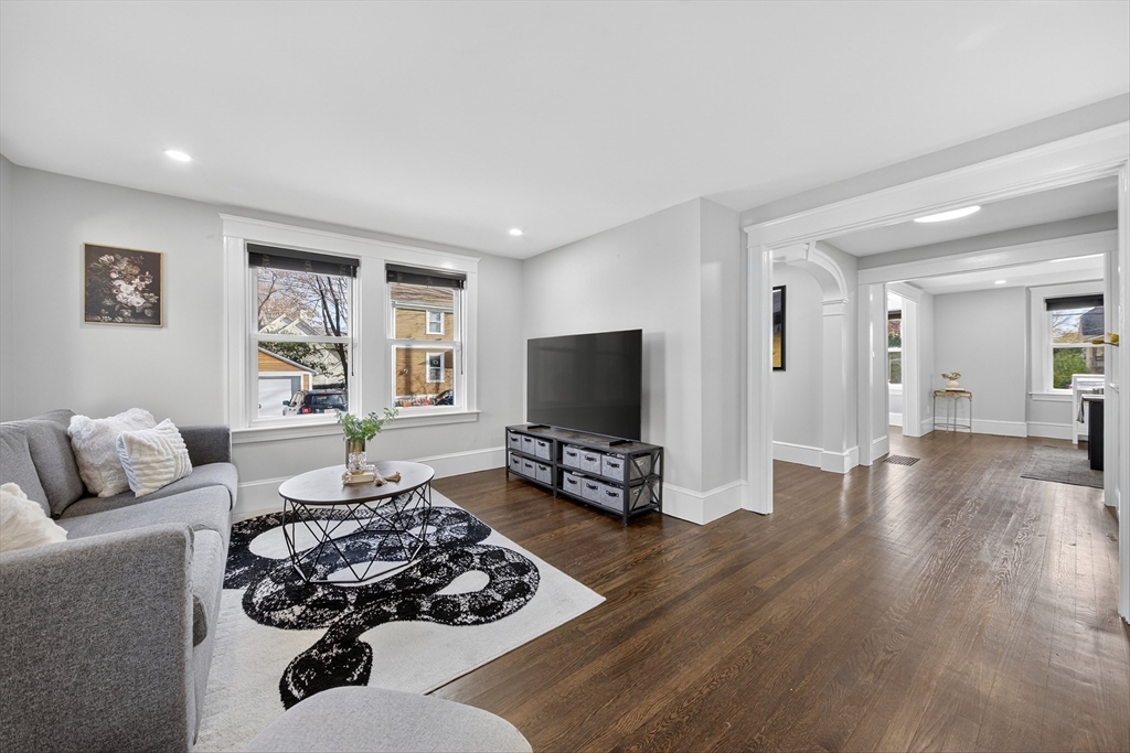 23 R Eddy Street North Attleboro, MA 02760 - Photo 9 of 29 a living room with furniture and a flat screen tv