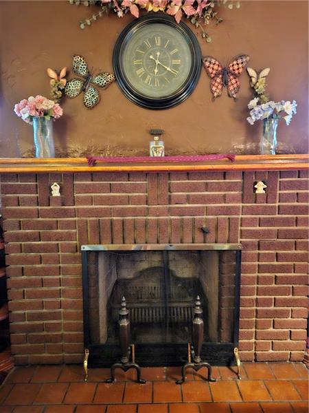 418 Saxonburg Road Butler, PA 16002 - Photo 6 of 27 a front view of a fireplace with wooden wall