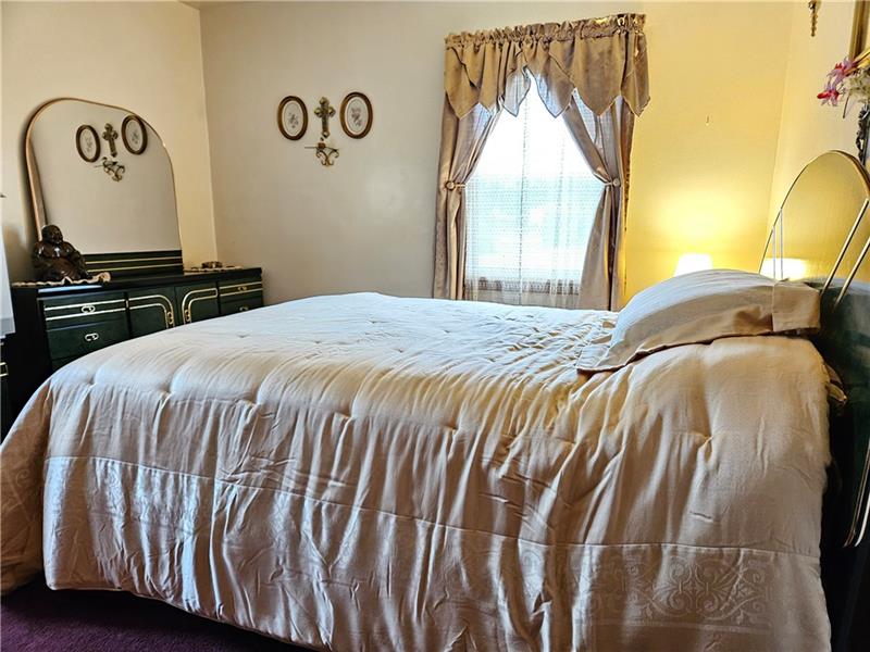 418 Saxonburg Road Butler, PA 16002 - Photo 10 of 27 a bedroom with a bed and a window