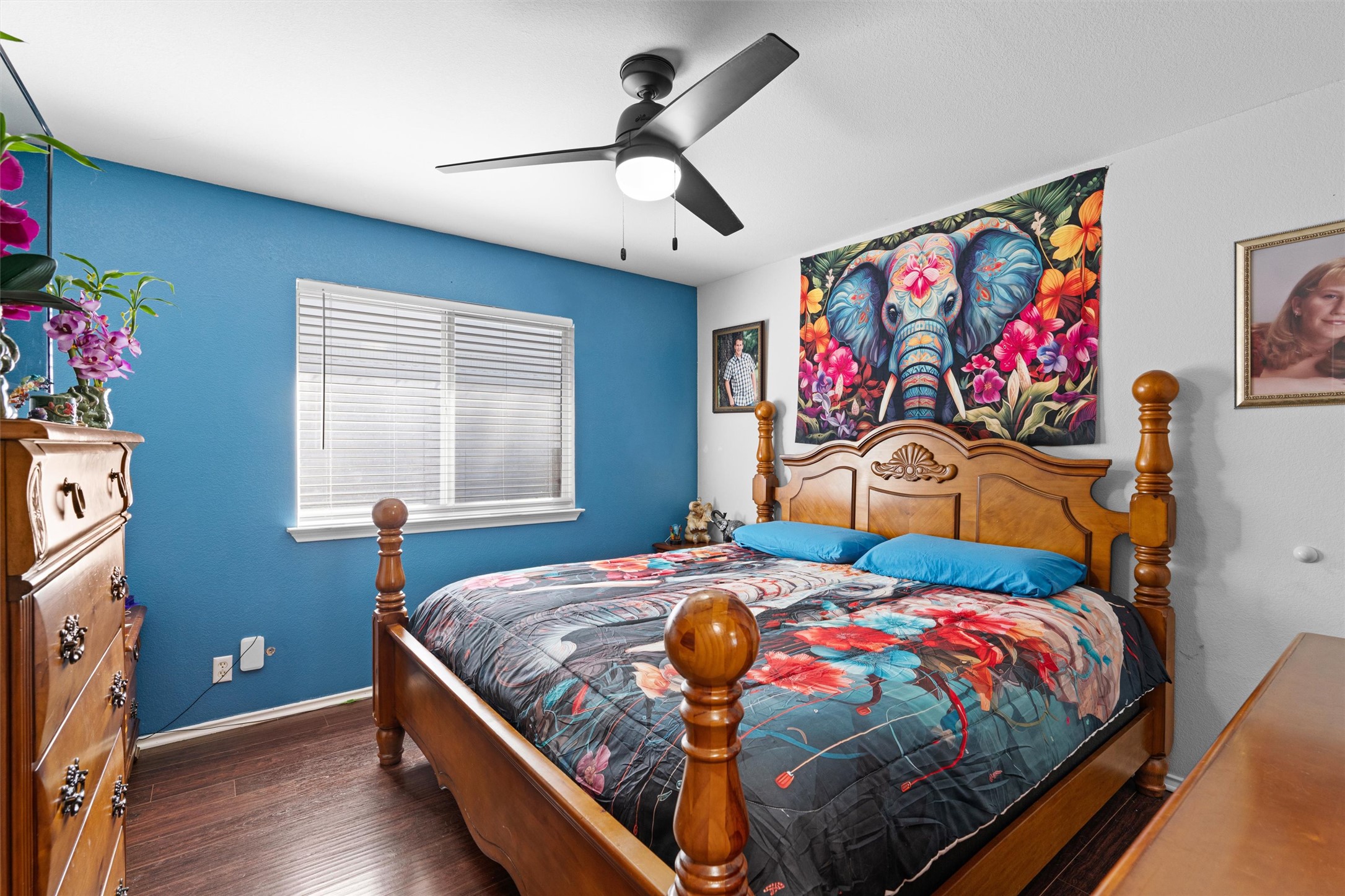 128 Steven Street Hutto, TX 78634 - Photo 17 of 29 a bedroom with bed and a window