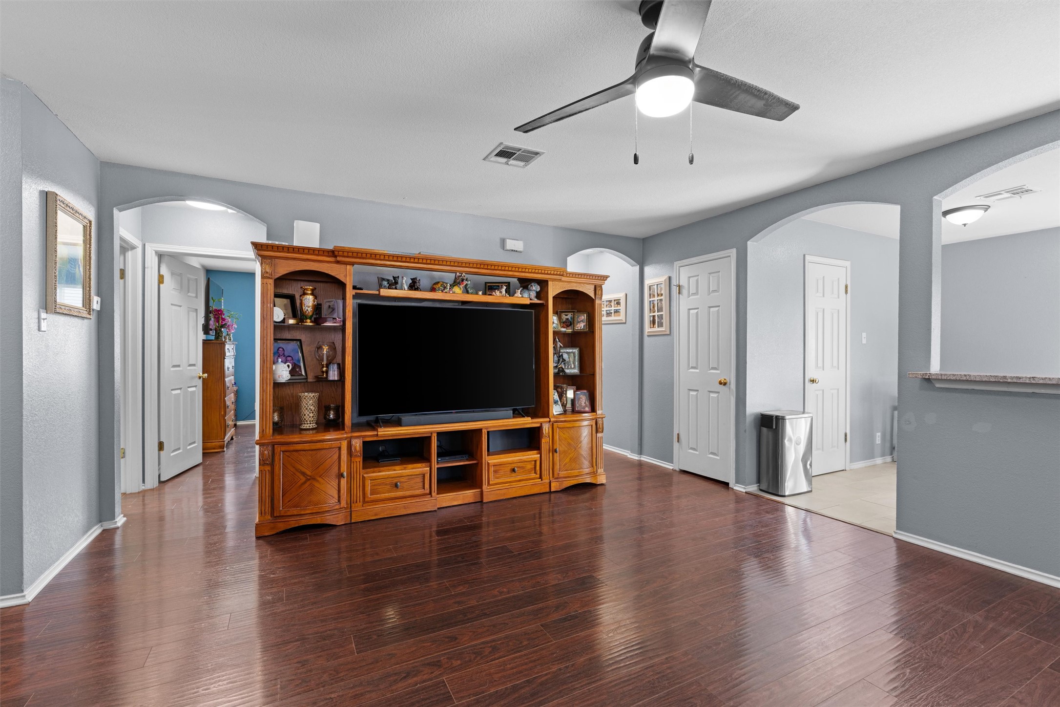 128 Steven Street Hutto, TX 78634 - Photo 6 of 29 a view of a livingroom with furniture wooden floor and window