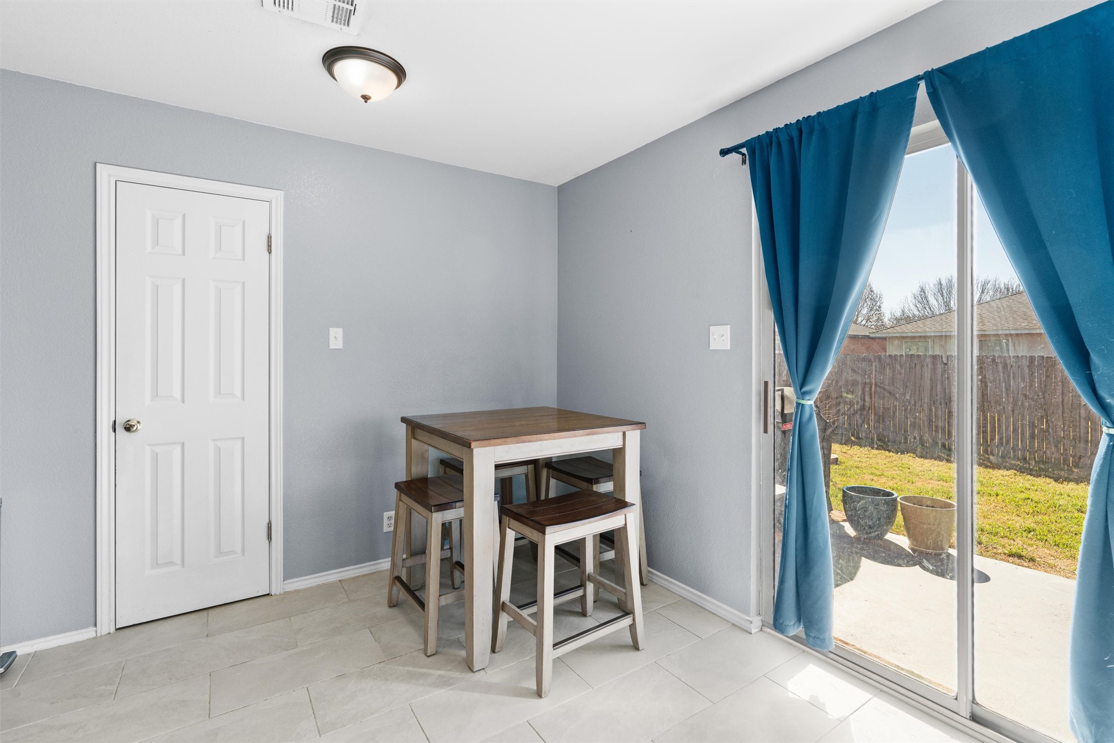 128 Steven Street Hutto, TX 78634 - Photo 10 of 29 a living room with a window