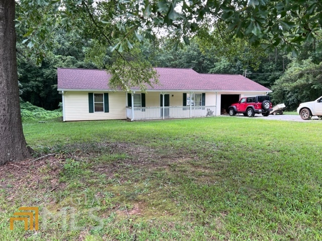 121 Dukes Road Jackson, GA 30233 - Photo 1 of 1 a front view of a house with garden