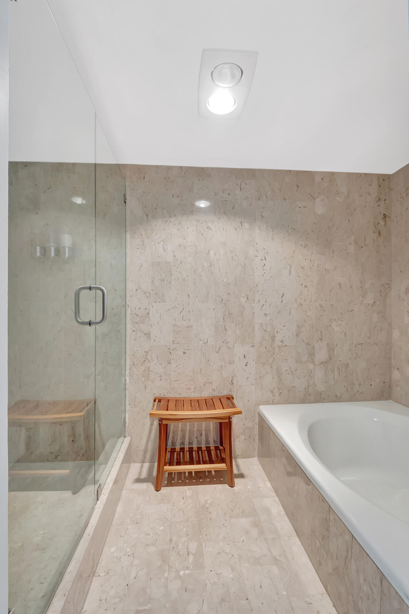 20100 Boca W Drive, Unit 126 Boca Raton, FL 33434 - Photo 22 of 58 a bathroom with a tub and shower