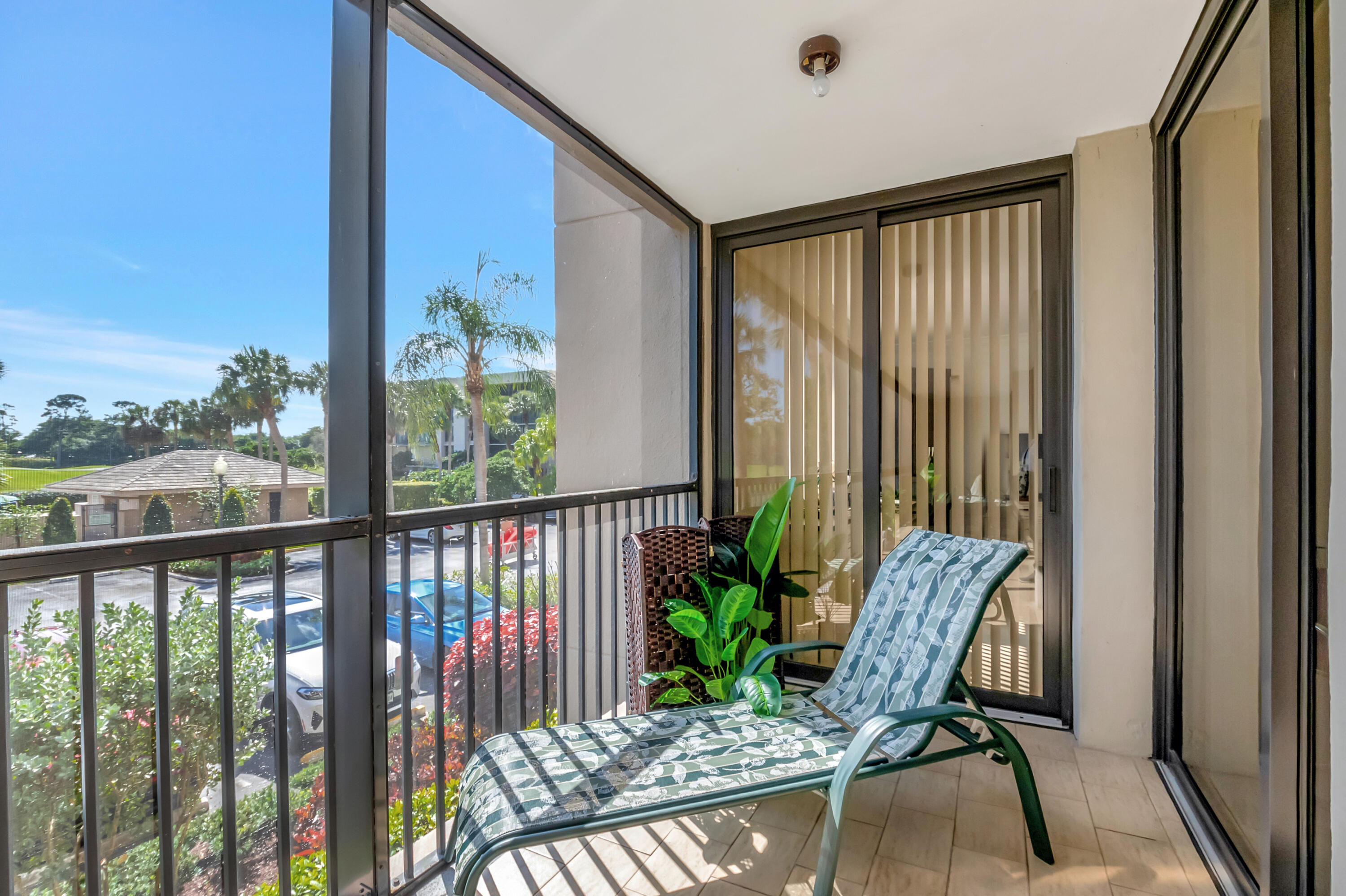 20100 Boca W Drive, Unit 126 Boca Raton, FL 33434 - Photo 26 of 58 a view of a balcony with furniture