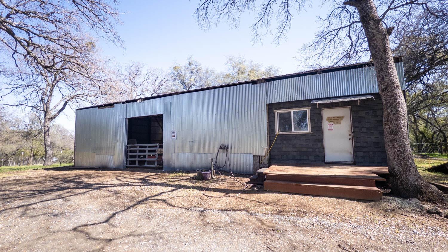 2661 Mountain Oak Lane Rescue, CA 95672 - Photo 77 of 87 Large pole barn with enclosed workshop and tons of storage