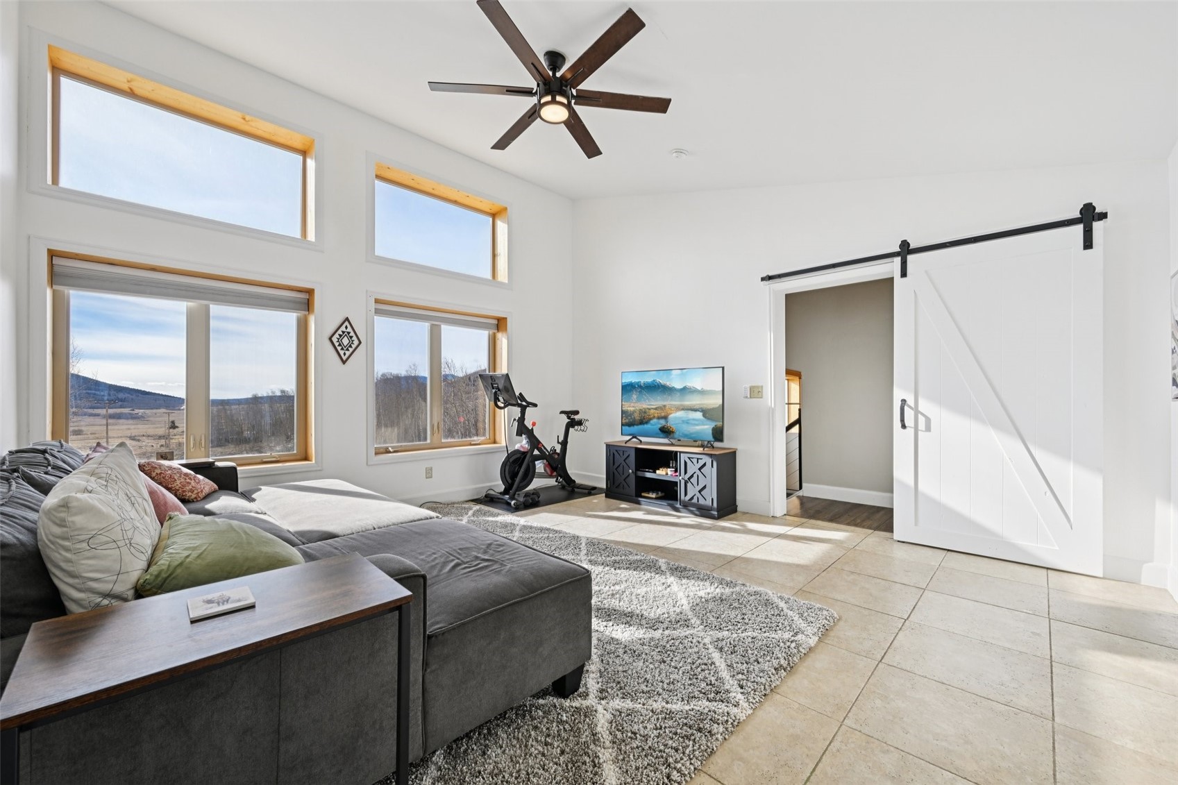 1499 Sheep Ridge Road Fairplay, CO 80440 - Photo 27 of 40 a bed room with furniture and a fireplace